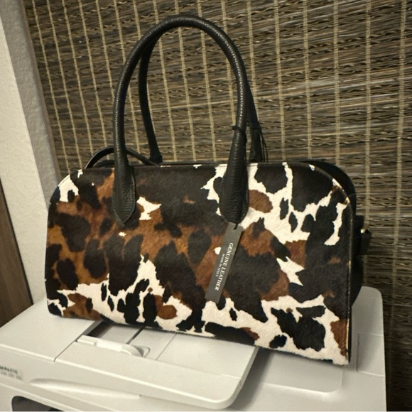 Claudia Firenze Handbags - Claudia Firenze Stylish Black and Brown calf hair cow print Satchel w/ crossbody